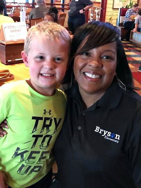 photo of Bryson teacher with student